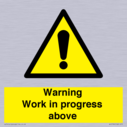 gender-neutral-construction-warning-sign-warning-work-in-progress-above-with-exc~